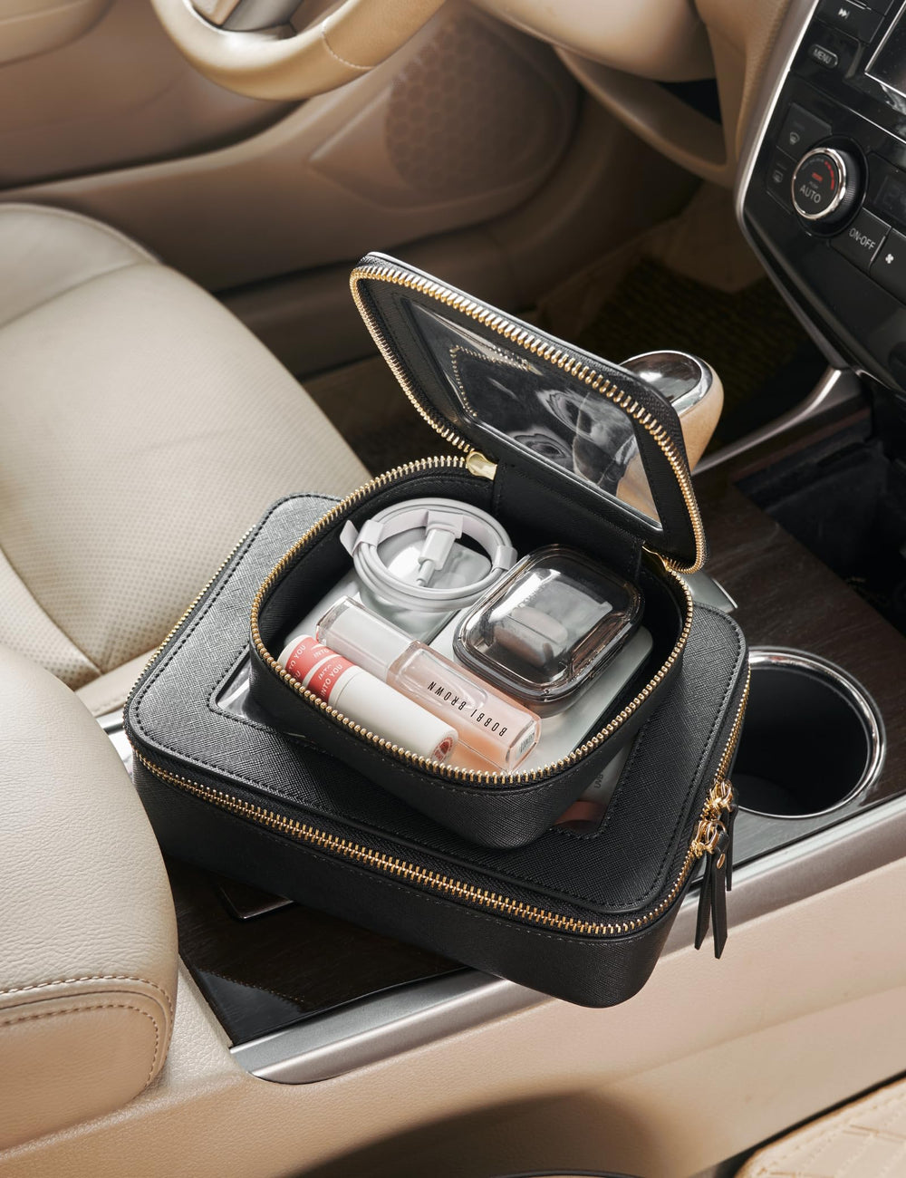 Popvibe mini clear black makeup bag side detail shot shows saffiano leather and hardware.