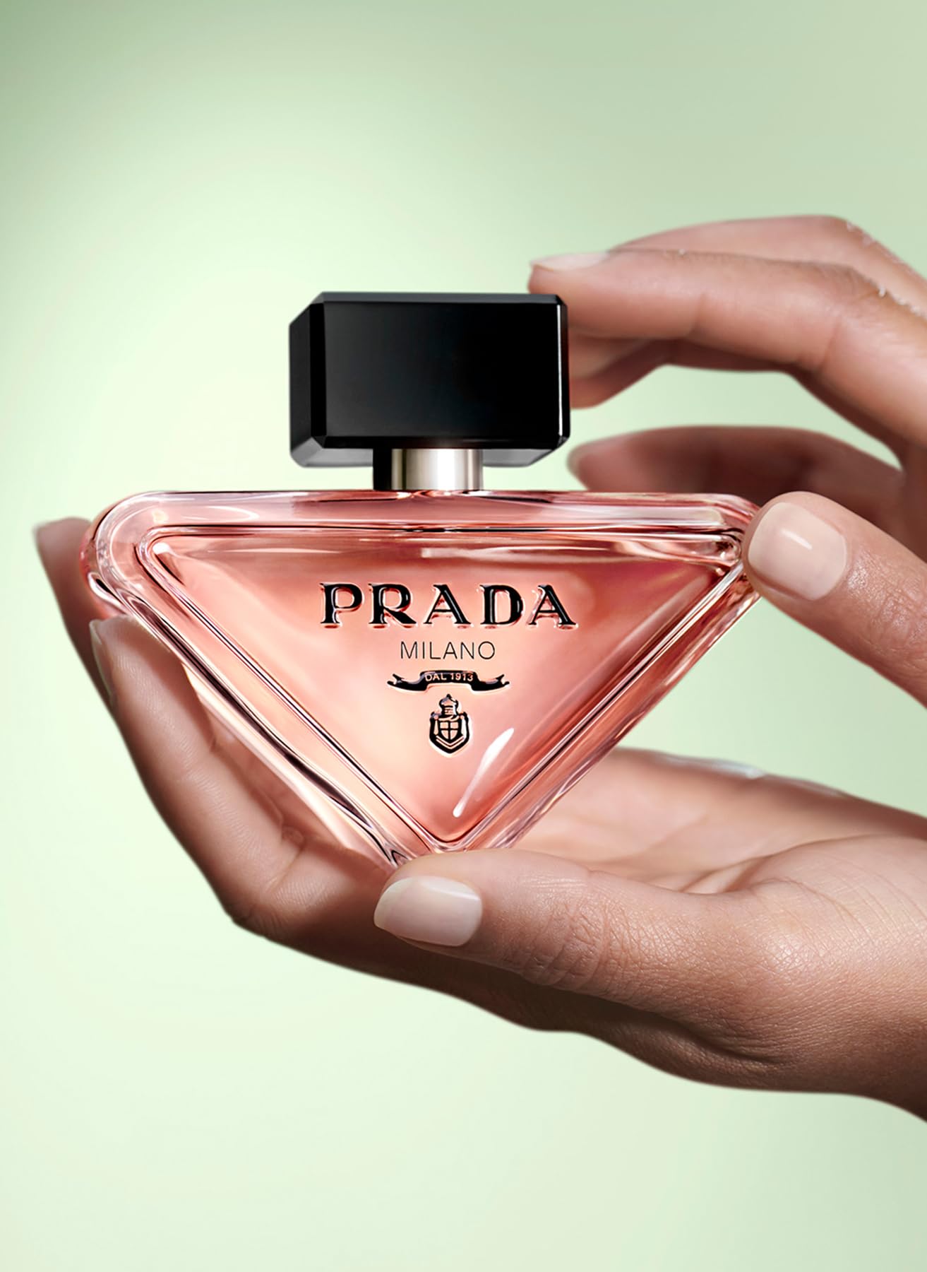 Prada Paradoxe perfume spray, easy application for refreshing fragrance.