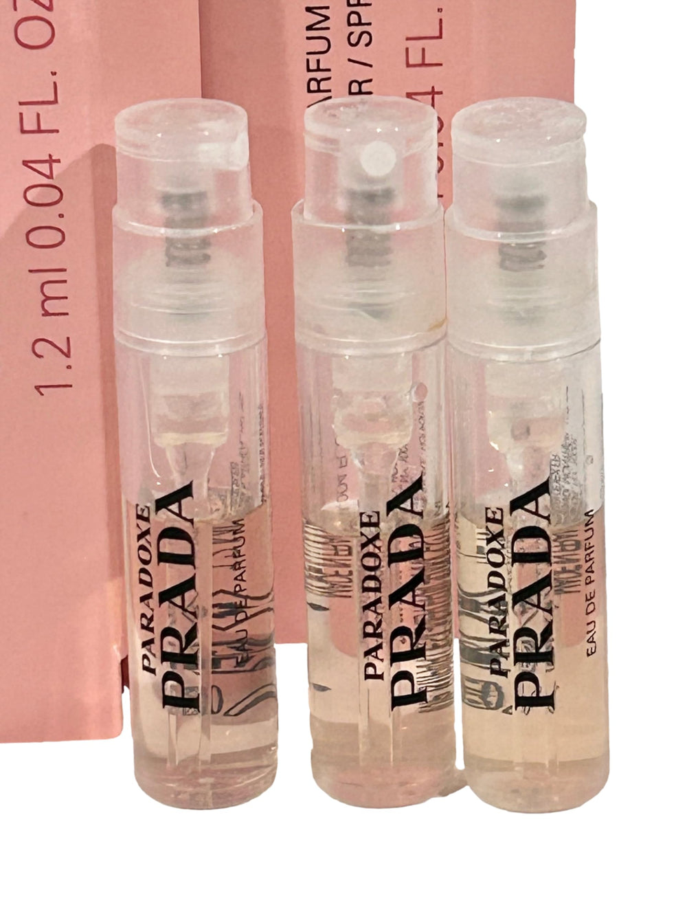 Prada Paradoxe vial close-up showing travel-friendly, discreet reapplication
