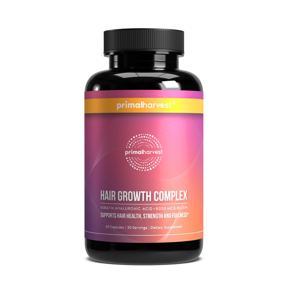 Primal Harvest Hair Growth Pills bottle for daily hair wellness routine.