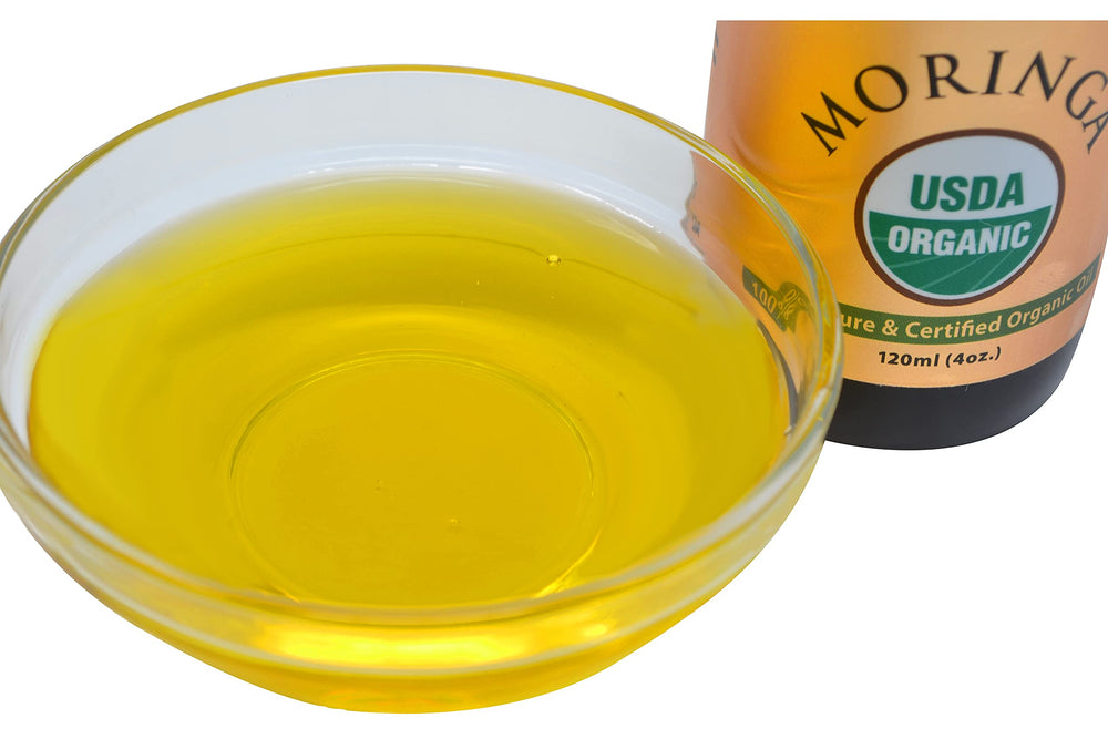 Prime Natural Moringa Oil ingredients-label highlights vegan, organic, cold-pressed quality.