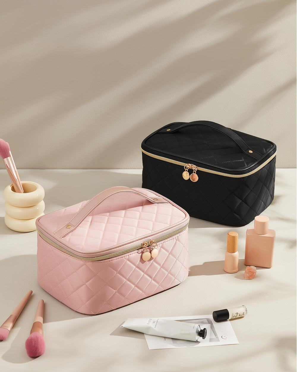 Prite makeup bag interior organization demonstrates compact, layered storage options.