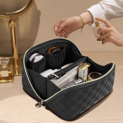 Prite makeup bag opened flat in plaid black shows three compartments