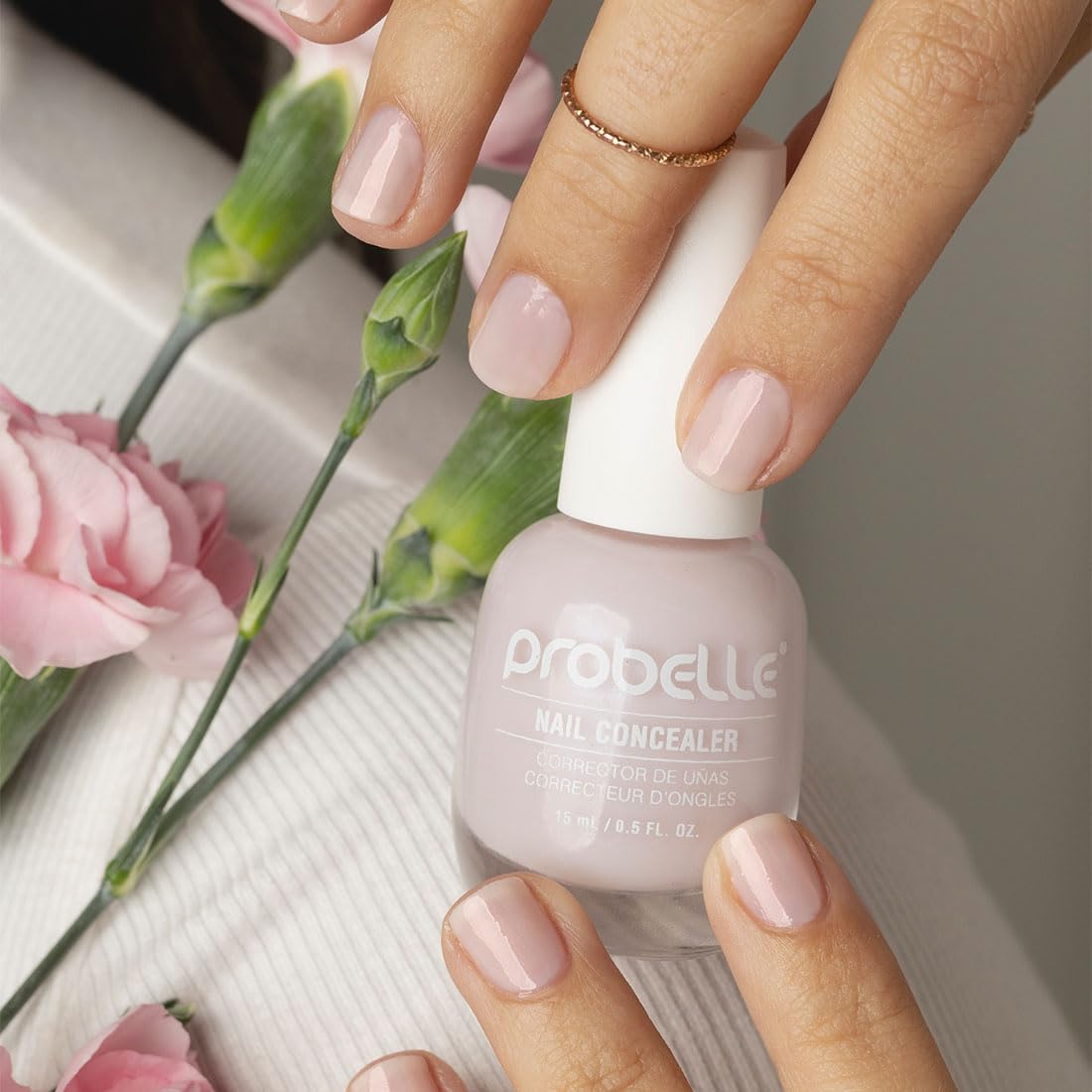Probelle Illuminating Nail Concealer on nails with soft-focus milky finish