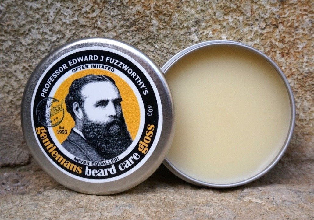 Professor Fuzzworthy's beard balm gloss packaging image highlights Tasmanian craftsmanship and travel-friendly size.