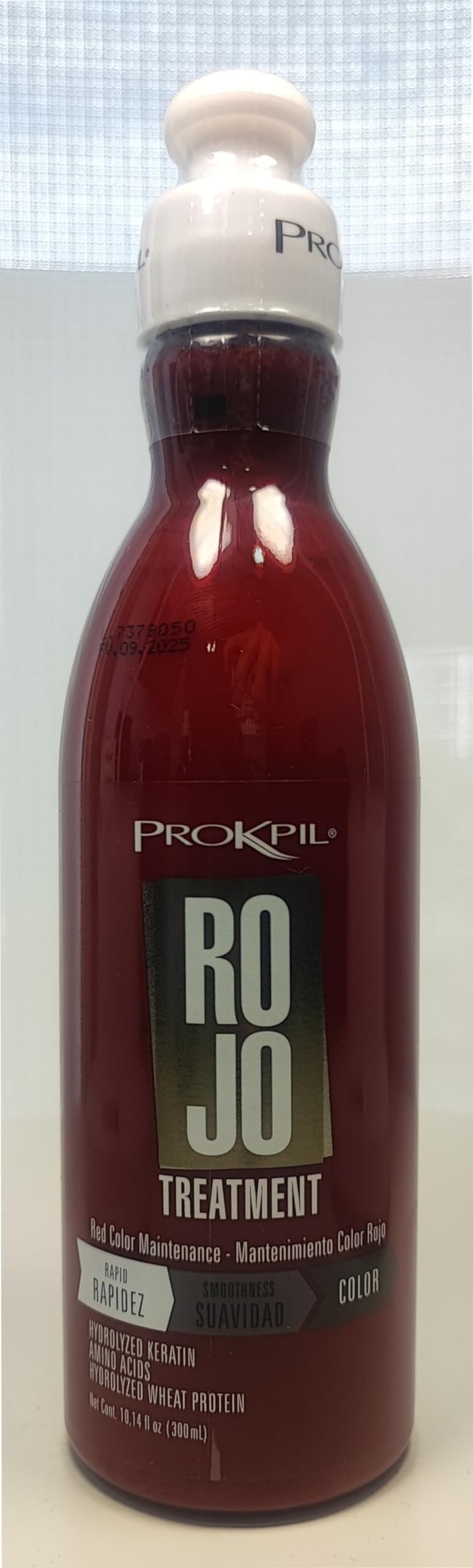 Prokpil Red Maintenance color swirl highlights cationic pigments reviving reddish tones.