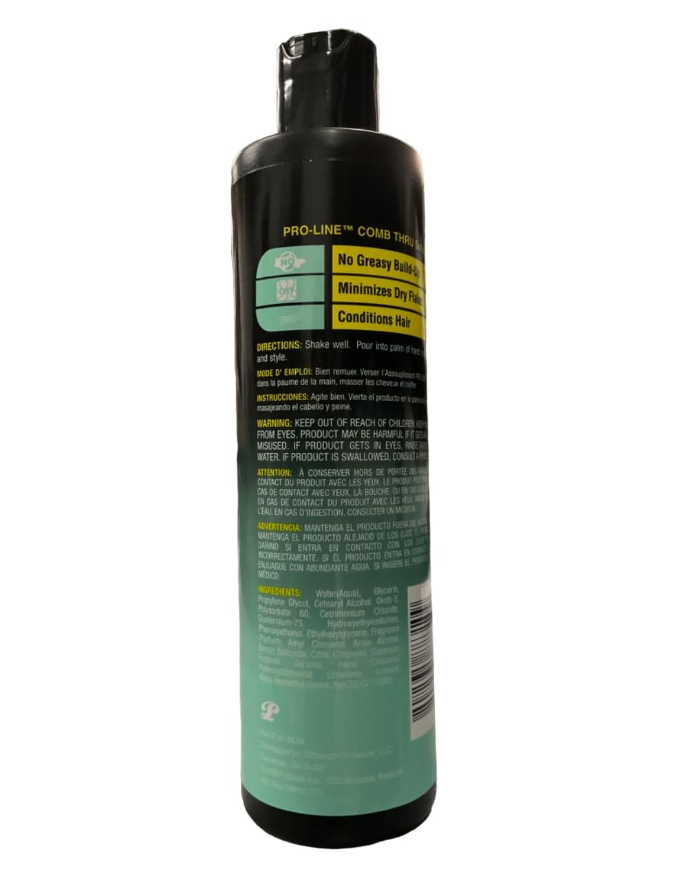 Pro-Line Comb-Thru Softener in use while brushing to glide through mats