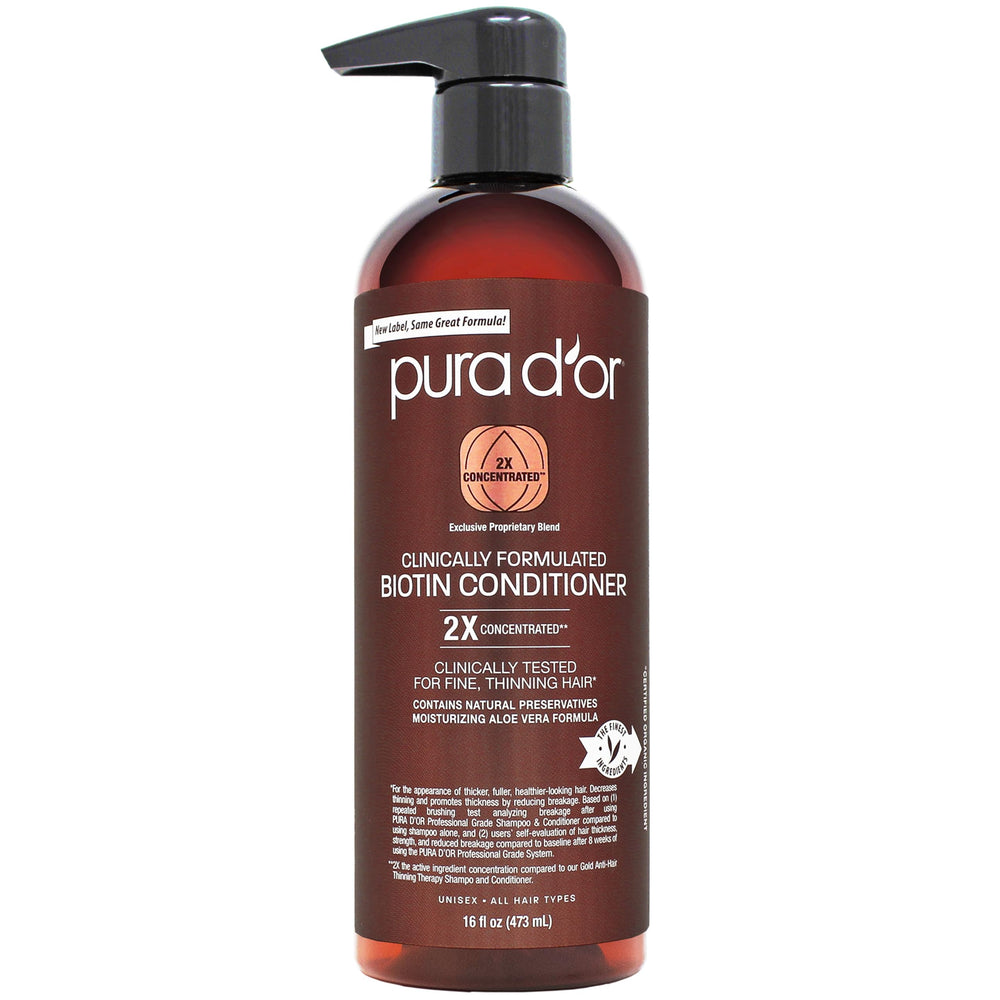 PURA D'OR biotin conditioner bottle pour demonstrates hydrating formula for shinier hair.