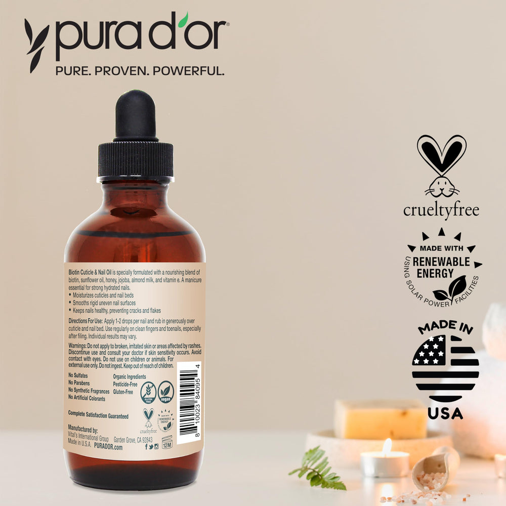 PURA D'OR nail oil on a manicure surface signals long-lasting hydration for smooth cuticles