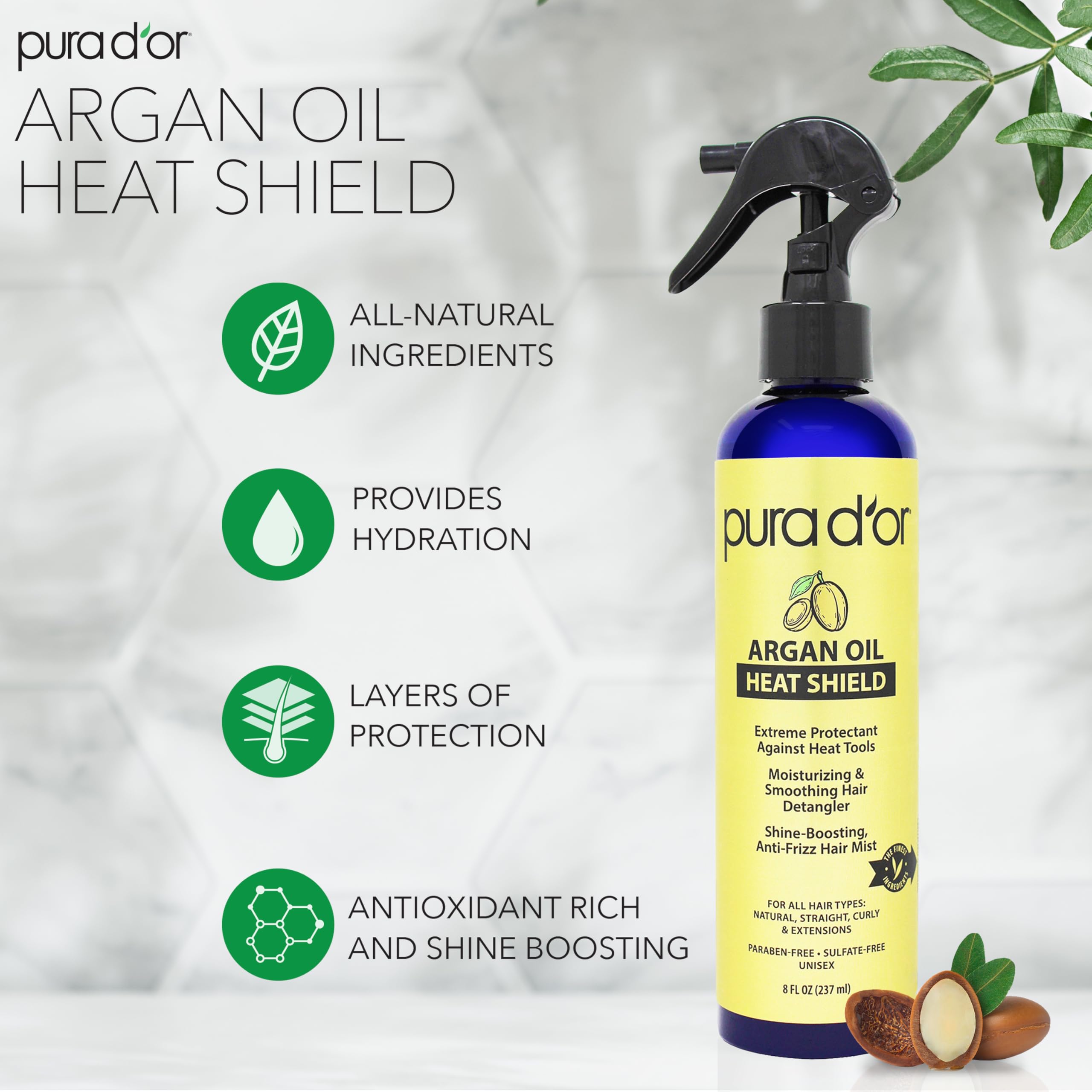Pura D’or heat shield spray applied to hands detangling and protecting hair during styling