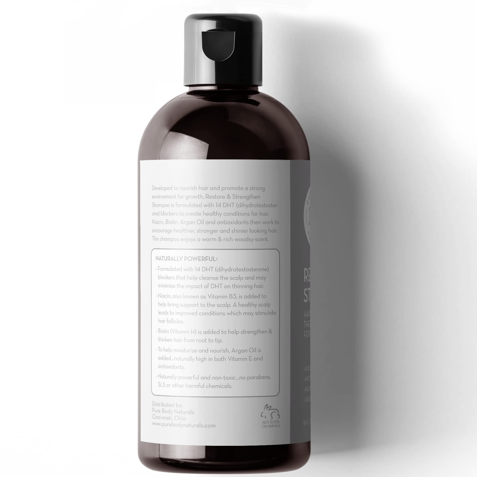 Pure Body Naturals Hair Loss Shampoo natural oils blend visual emphasizing nourishing botanicals.