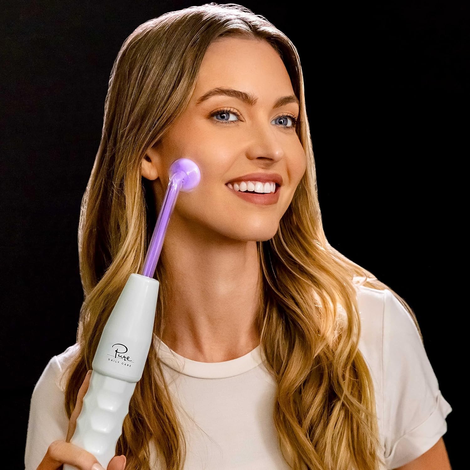 Pure Daily Care NuDerma rod wand delivers broader-area skin energizing sessions