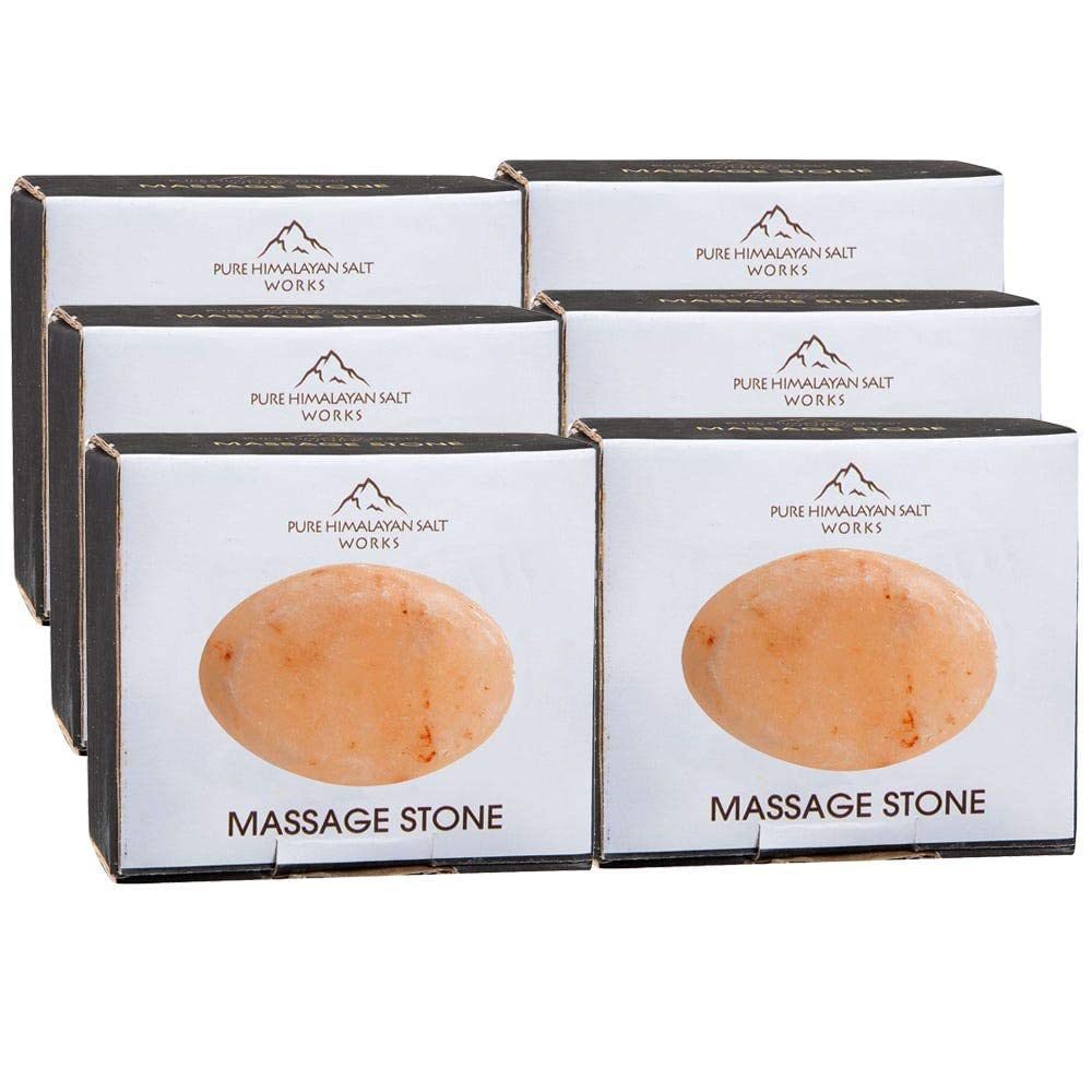 Pure Himalayan Salt Works pink crystal close-up highlighting natural texture for spa-grade massage.