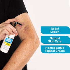Pure Relief Arnica Cream application hand demonstrates massage-ready consistency for swelling reduction.