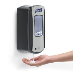 Purell LTX-12 dispensing action demonstrates hands-free operation for high-traffic areas.