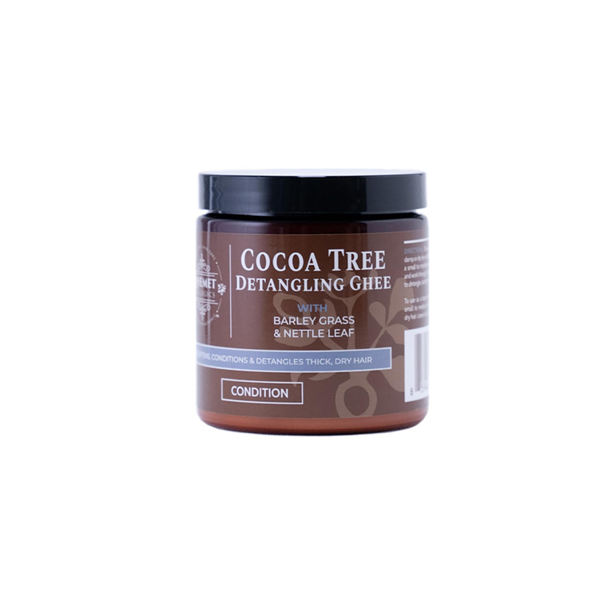 Qhemet Biologics Cocoa Tree Detangling Ghee bottle delivering rich softening moisture for high-porosity hair.