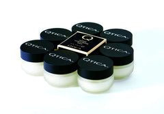 QTICA Intense Cuticle Repair Balm being applied to nails for quick daily repair.