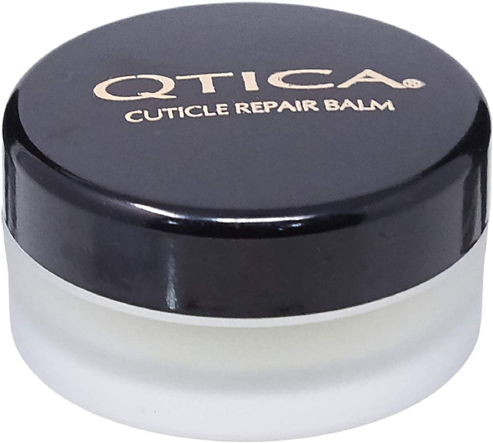 QTICA Intense Cuticle Repair Balm jar closeup highlighting rich texture for dry cuticles.