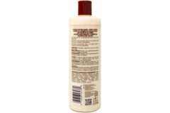 Queen Helene Cocoa Butter Hand & Body Lotion close-up highlights natural ingredients for nourished skin.