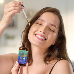 QUEEN OF THE THRONES eye makeup remover bottle with gentle castor oil for delicate cleansing.