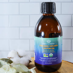 QUEEN OF THE THRONES Organic Golden Castor Oil label detail showing info and purity.