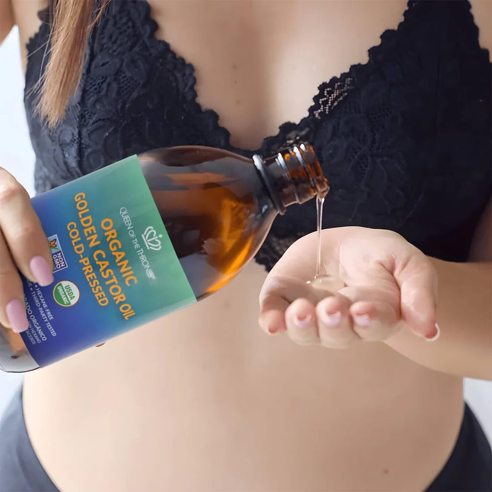 QUEEN OF THE THRONES soothing massage oil bottle for relaxation and skin comfort.