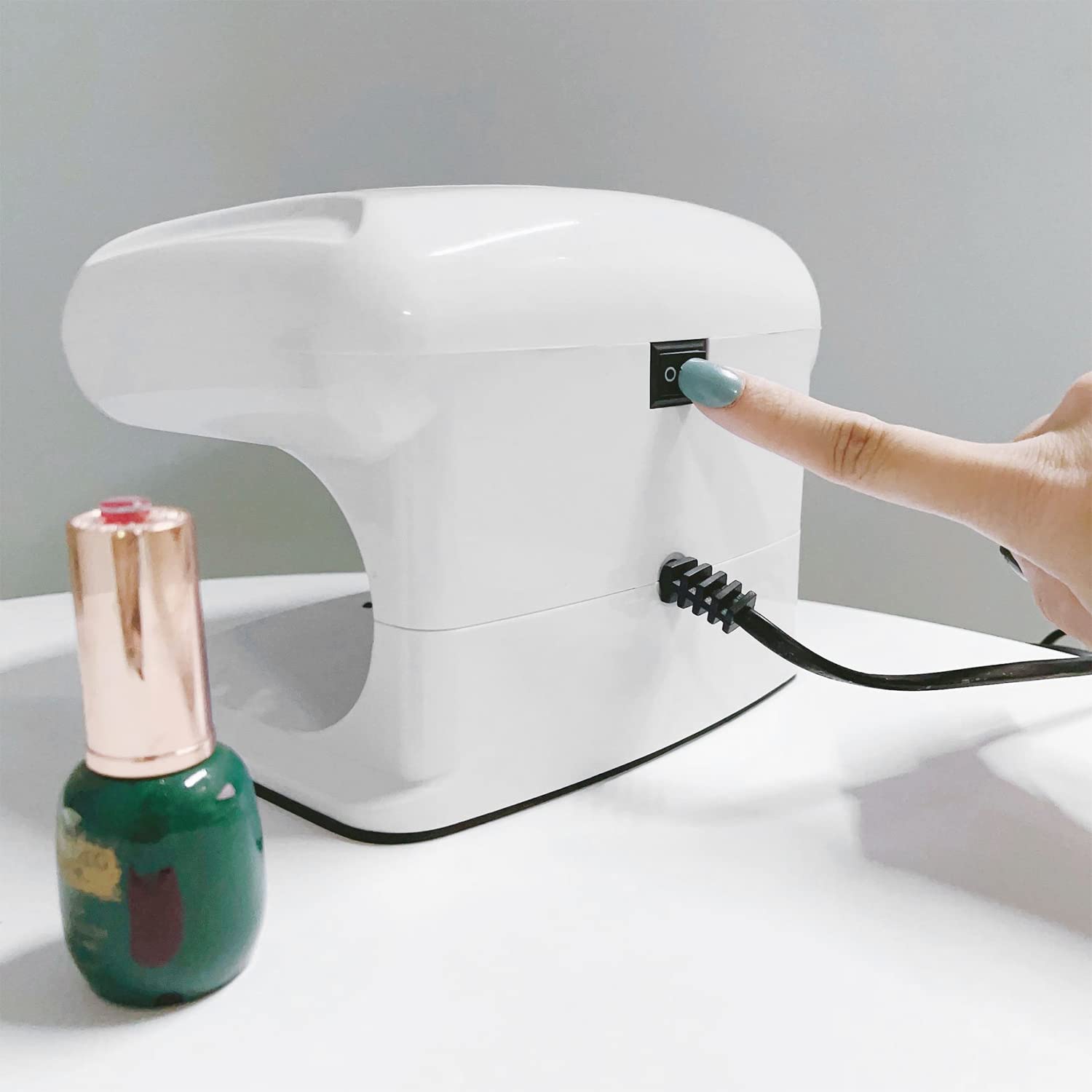 QUTUNI nail dryer home-manicure setup for convenient self-care.