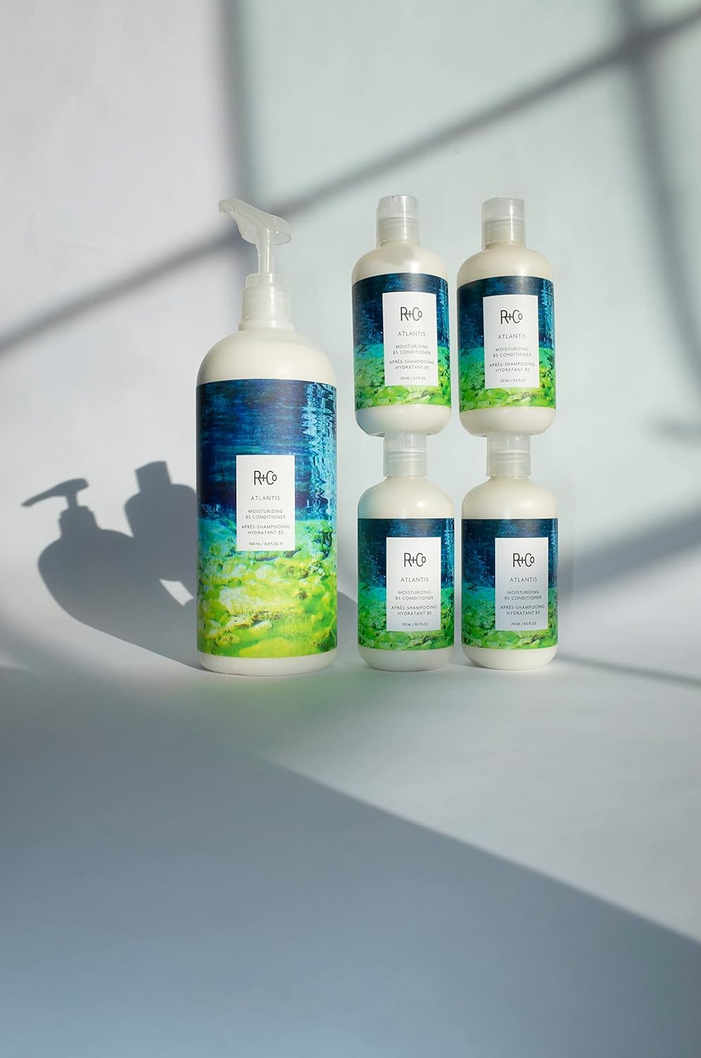 R+Co Atlantis conditioner pump dispensing shot for easy daily hydration