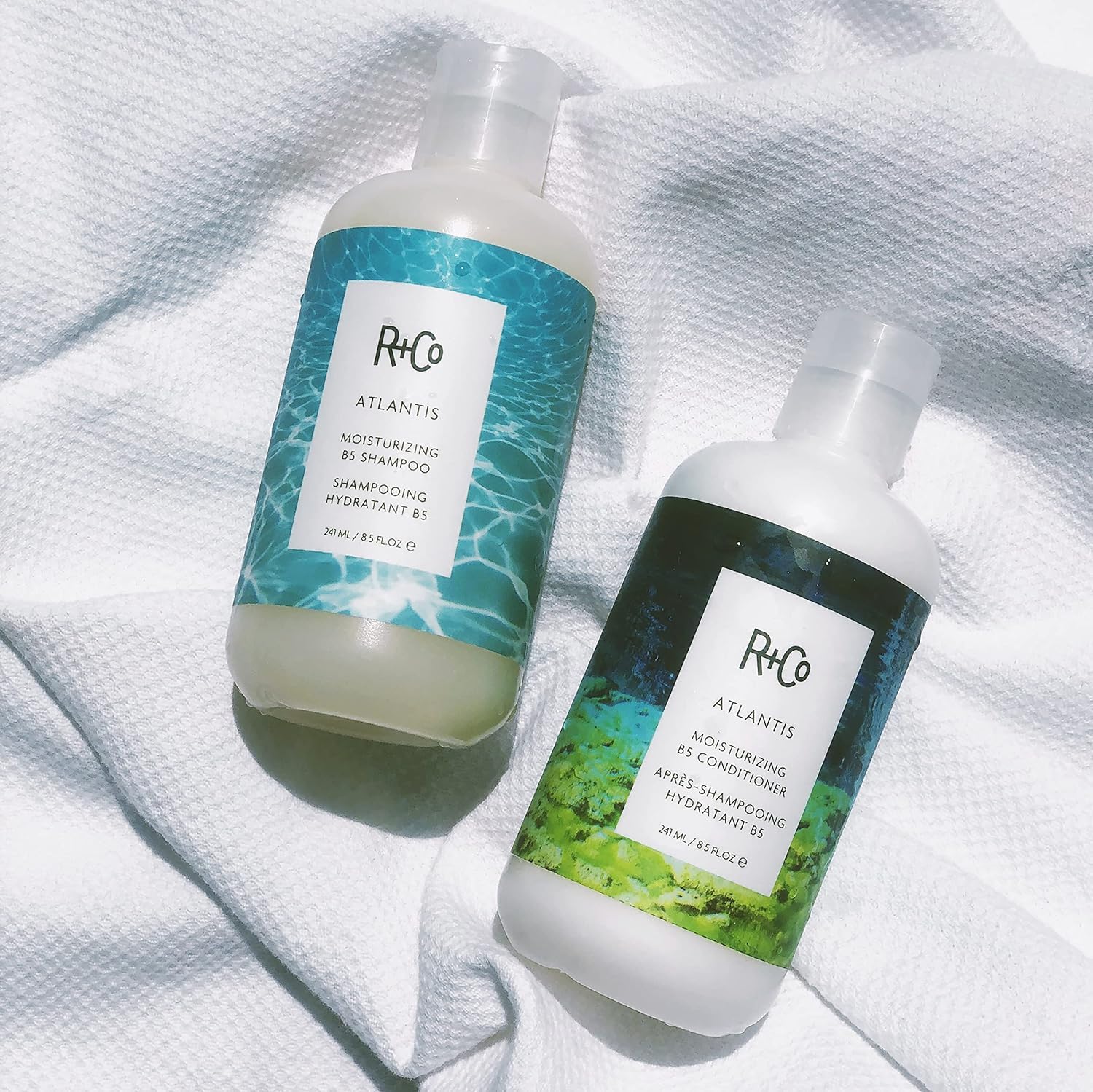 R+Co Atlantis leaves frizz control shot showing smooth, manageable hair after use.