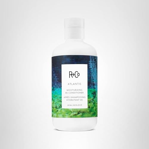 R+Co Atlantis Moisturizing B5 conditioner on display conveys luxury hair care experience.