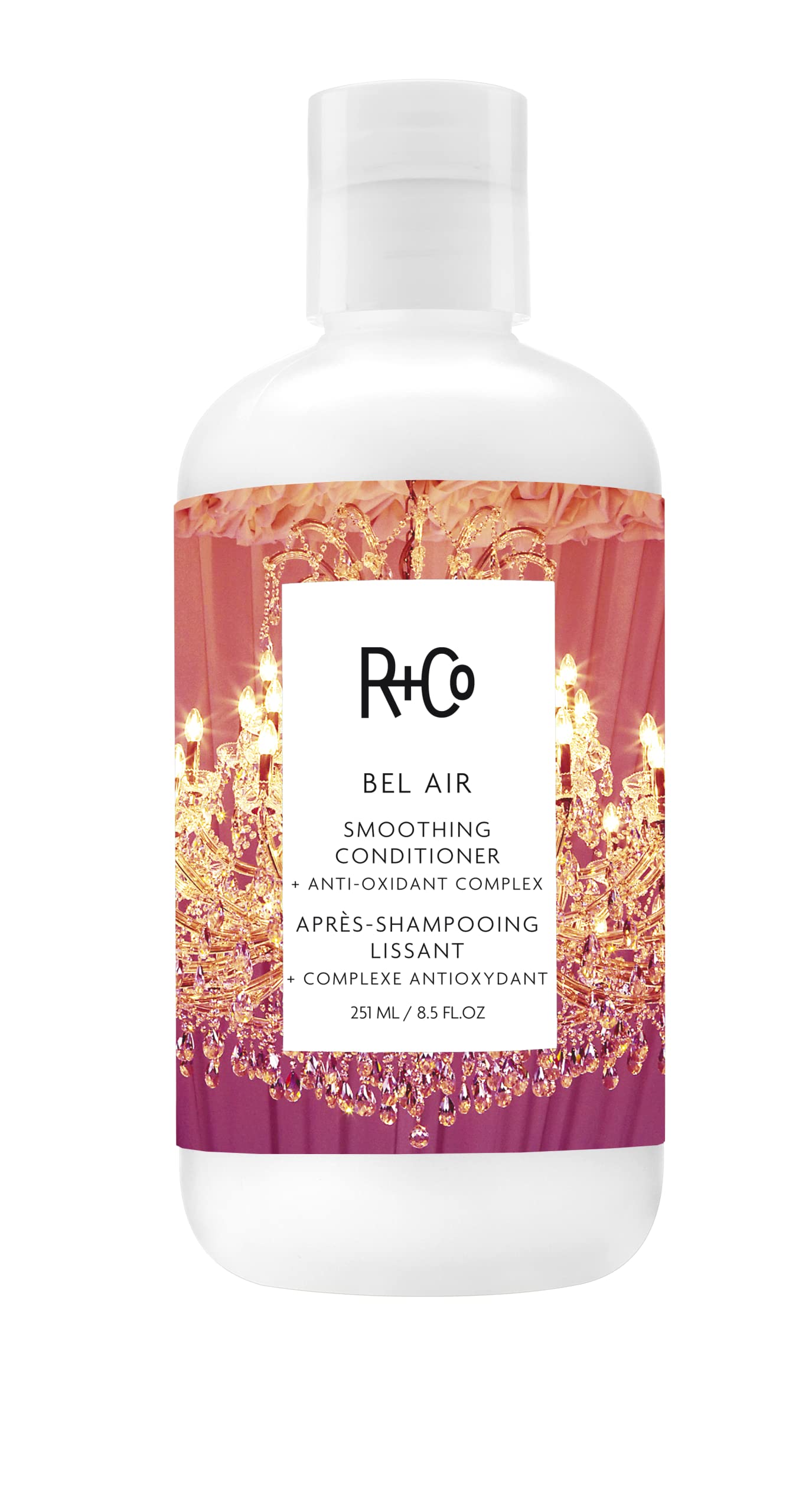 R+Co BEL AIR smoothing conditioner bottle close-up for sleek, frizz-free styling.