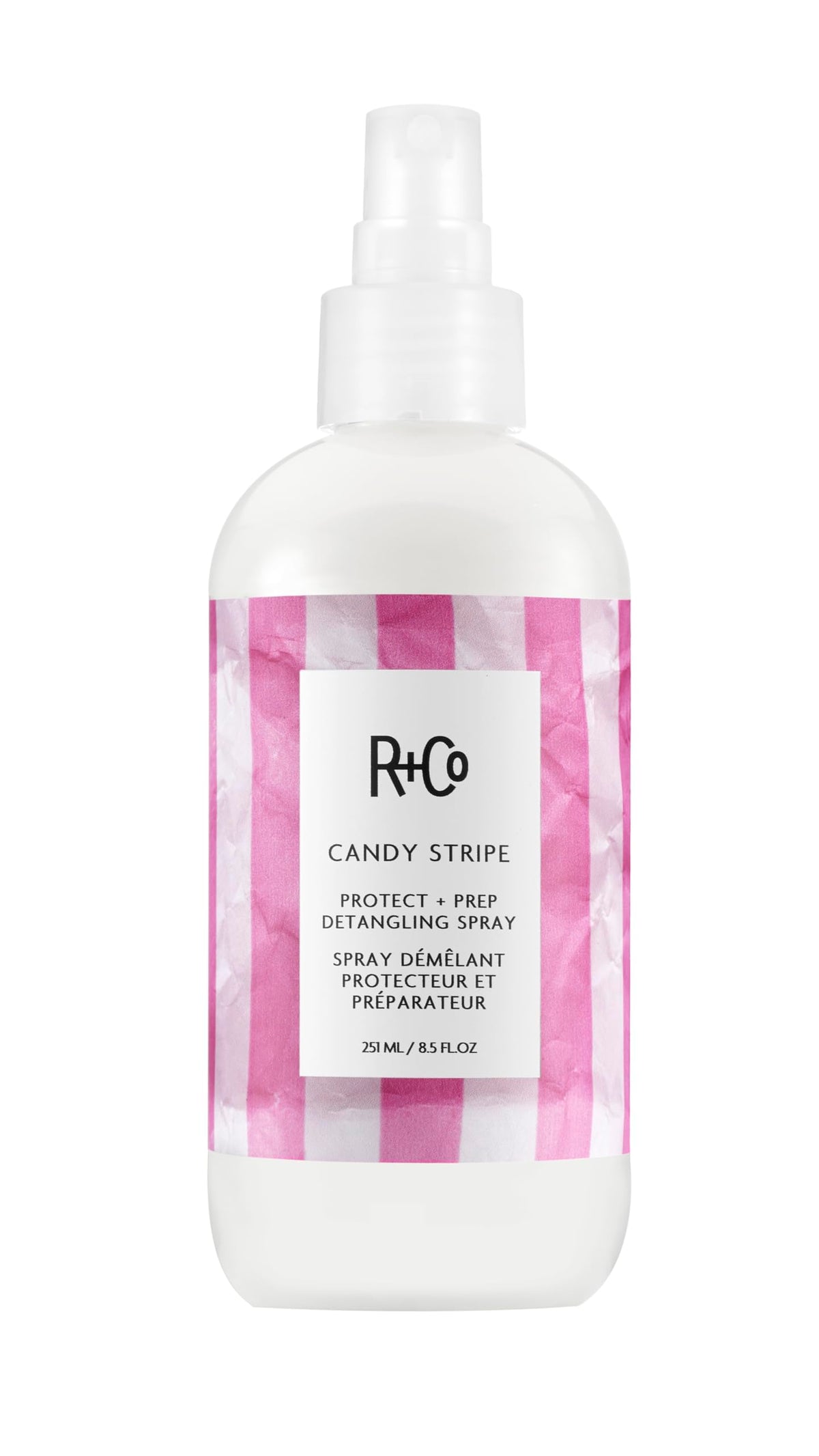 R+Co Candy Stripe detangling spray bottle for effortless detangling.