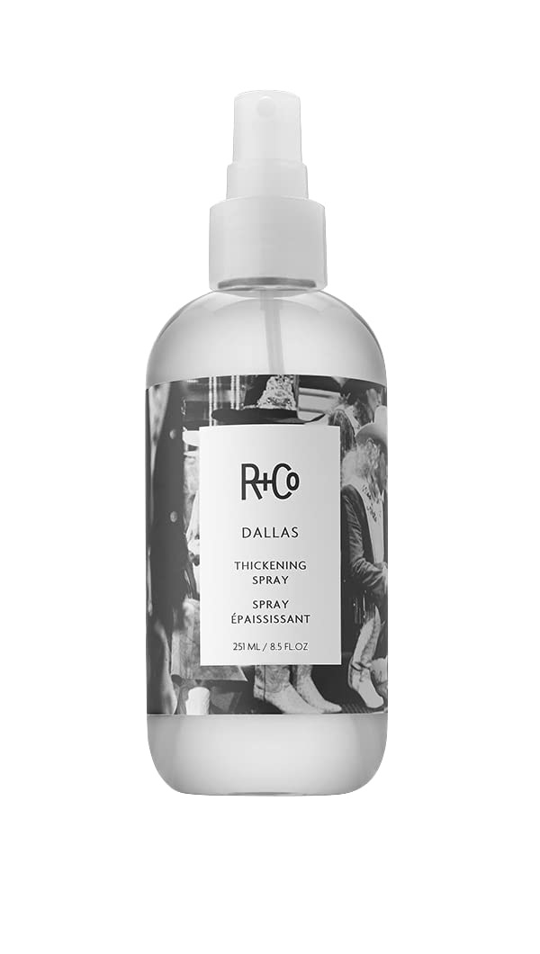 R+Co Dallas thickening spray bottle close-up boosts volume for all hair lengths.