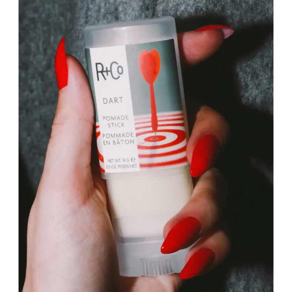 R+Co Dart Pomade Stick twist-cap detail enables quick, clean application while traveling.