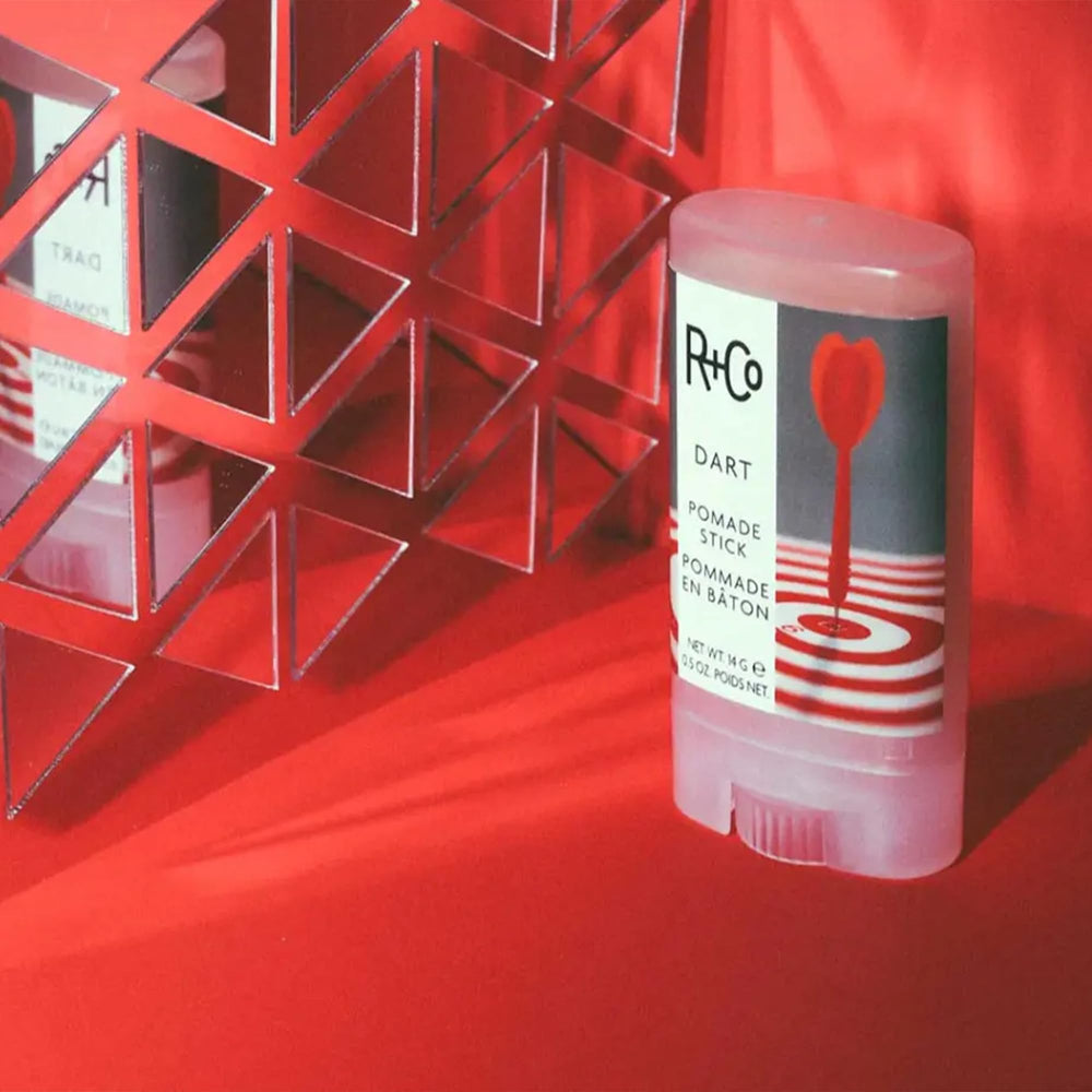 R+Co Dart Pomade Stick highlights vegan, sulfate-free and paraben-free formula.