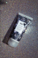 Glossy hair close-up after applying R+Co Gemstone Ultra Shine.