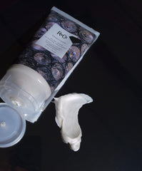 Glossy strand under UV light demonstrates R+Co Gemstone Ultra Shine protection.