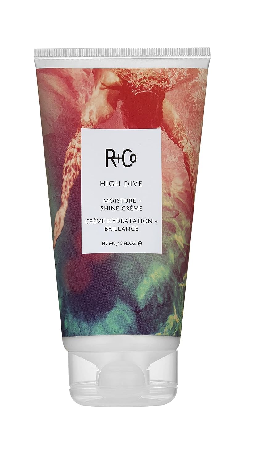 R+Co High Dive cream jar closeup showing hydration-rich texture.