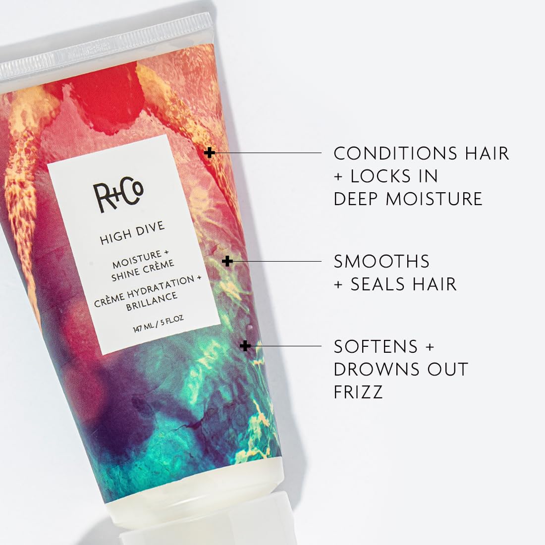 R+Co High Dive hair hands application demonstrates smoothing and even moisture distribution.