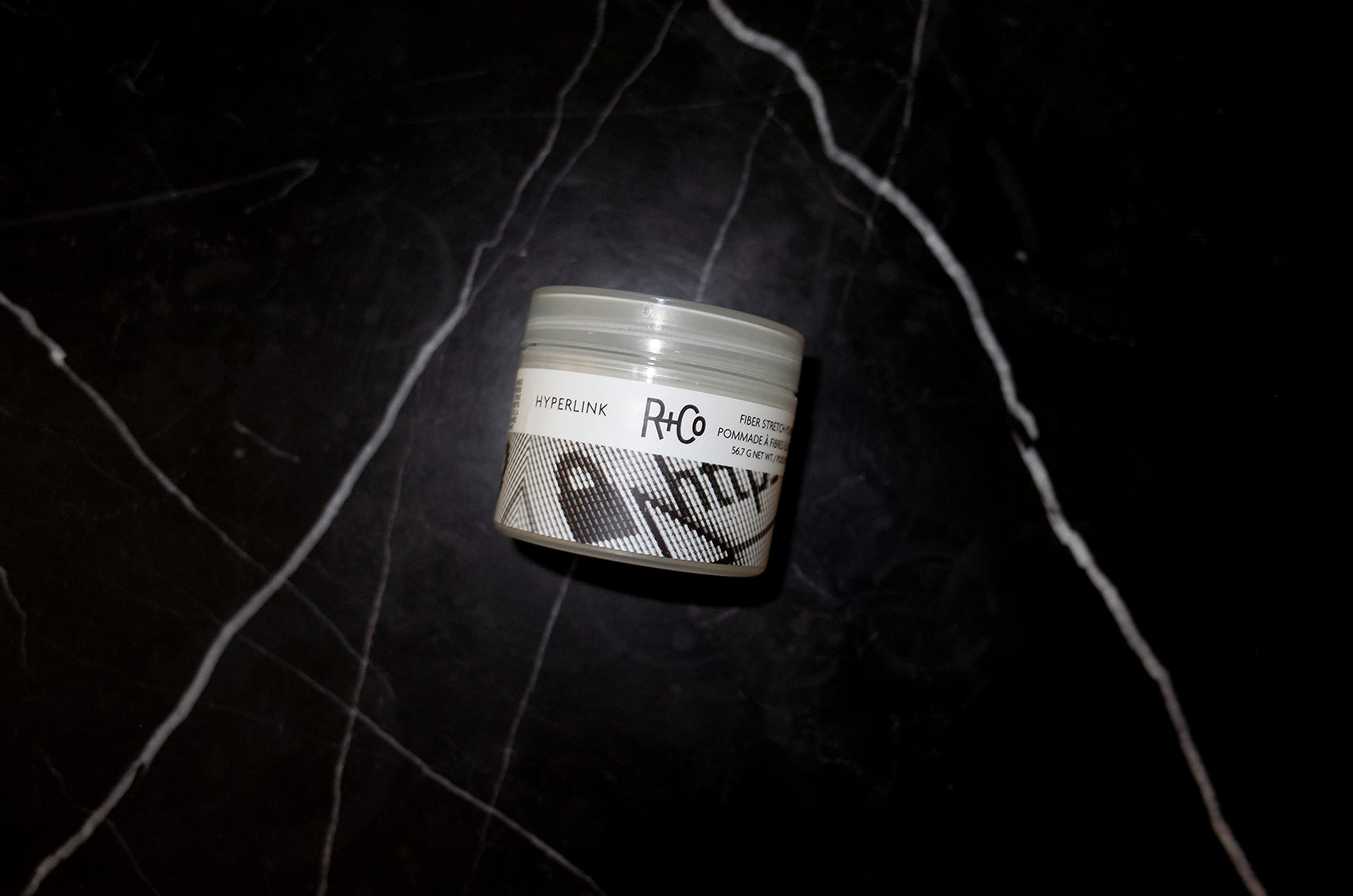 R+Co Hyperlink pomade applied to hair for texture and volume