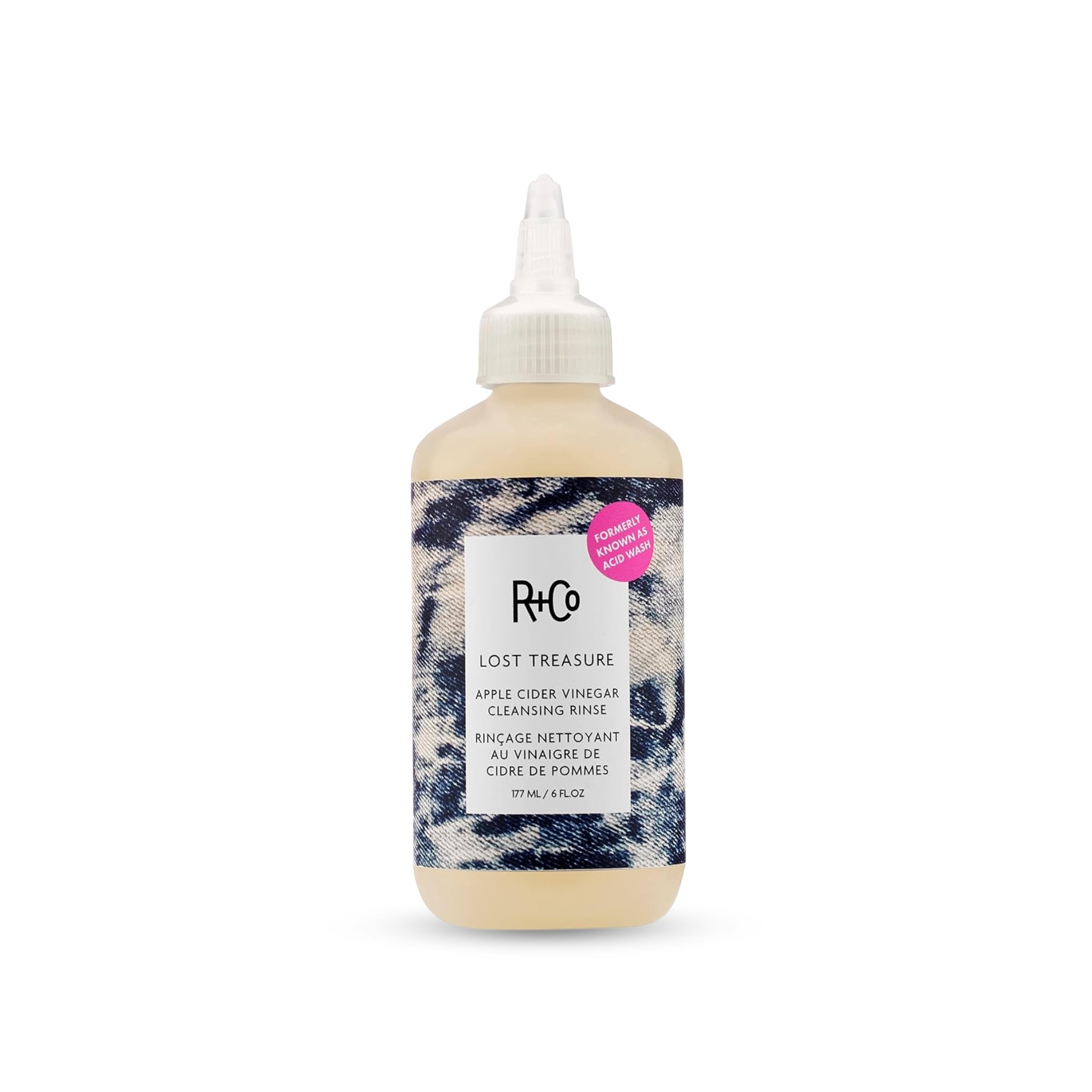 R+Co Lost Treasure ACV Cleansing Rinse bottle demonstrates gentle, color-safe cleansing