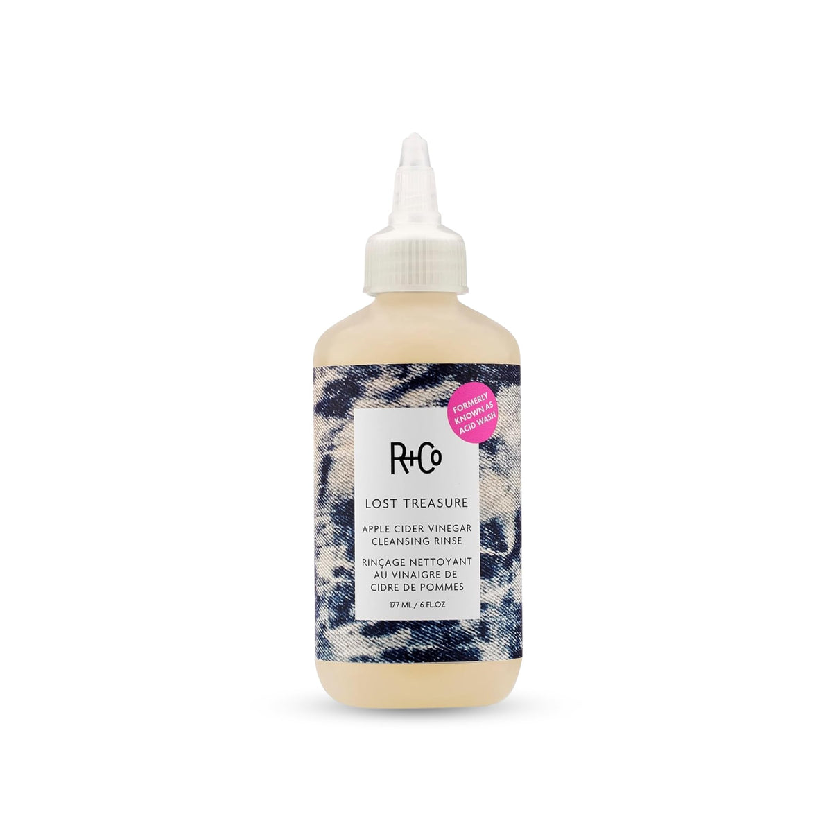 R+Co Lost Treasure ACV Cleansing Rinse bottle demonstrates gentle, color-safe cleansing