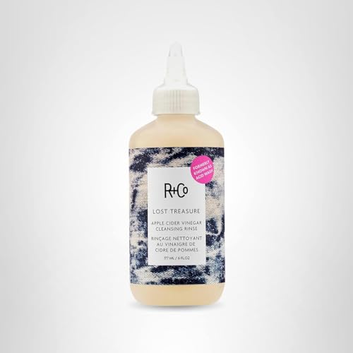 R+Co Lost Treasure ACV Cleansing Rinse bottle on shelf for dry-shampoo transitions