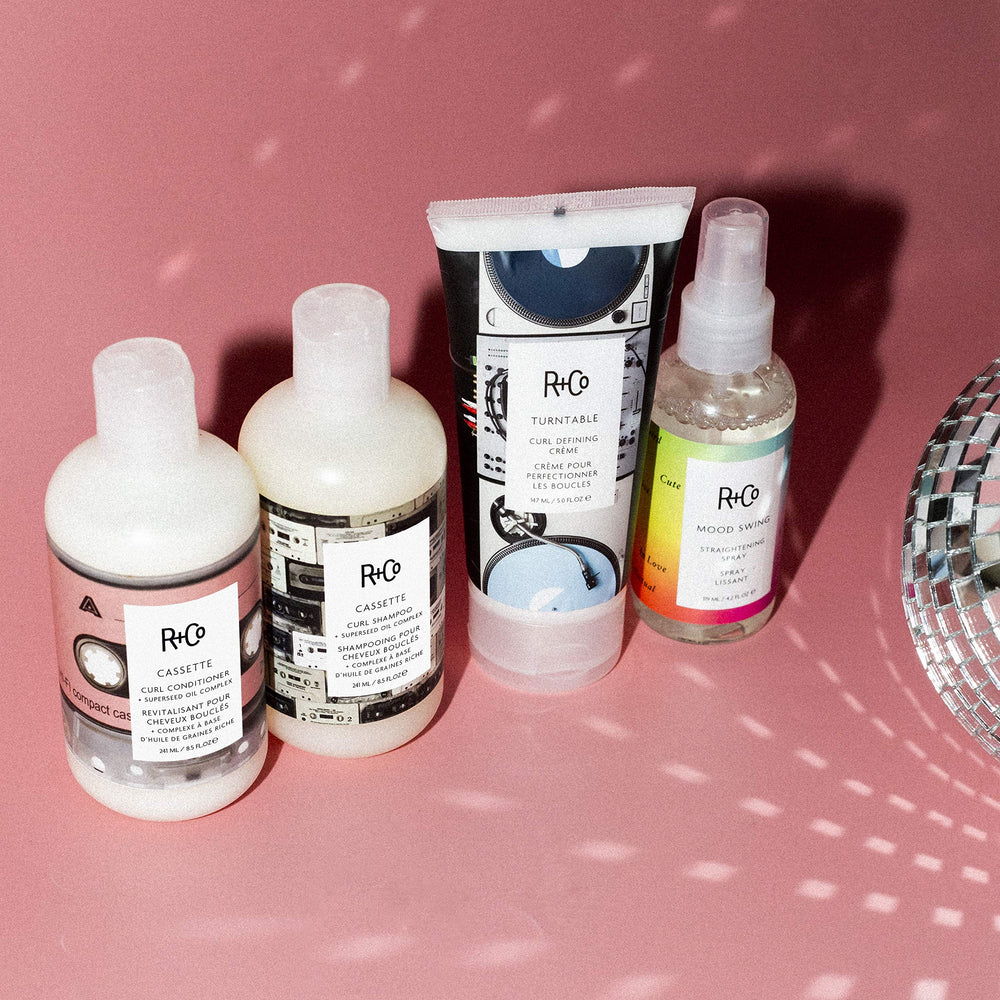 R+Co Mood Swing closeup highlights radiant shine after heat-activated straightening.