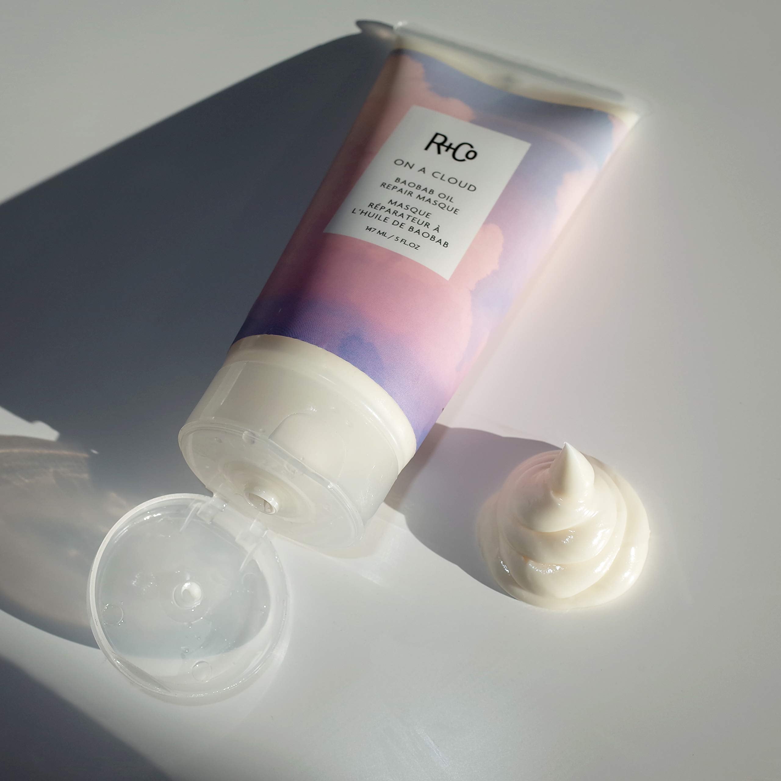 R+Co On A Cloud Baobab Oil Repair Masque hair application scene showing nourishment