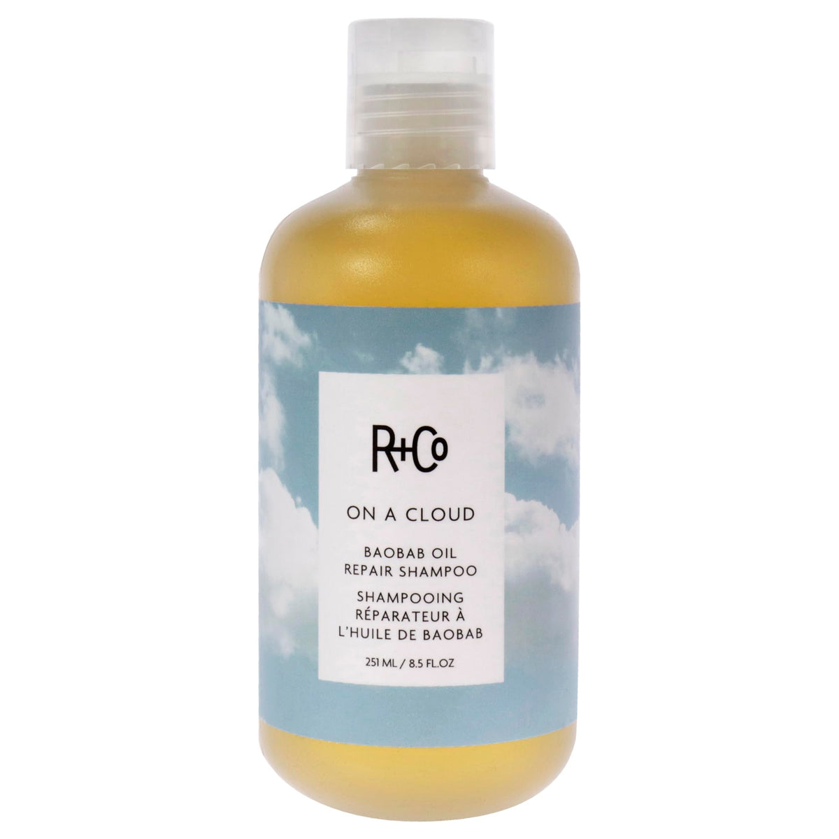 R+Co On A Cloud Baobab Repair Shampoo bottle shows gentle cleansing for damaged hair.
