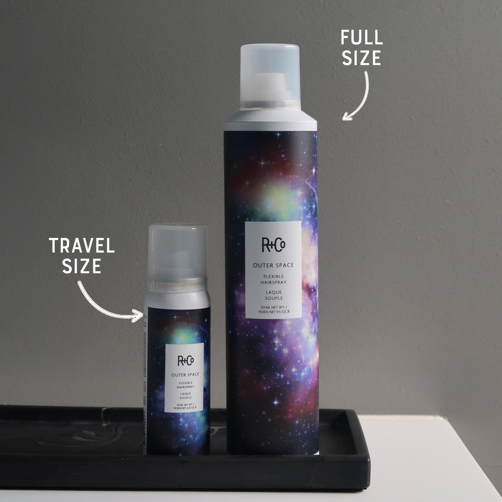 R+Co Outerspace Light Hair Spray hand-application shows quick on-the-go touch-ups
