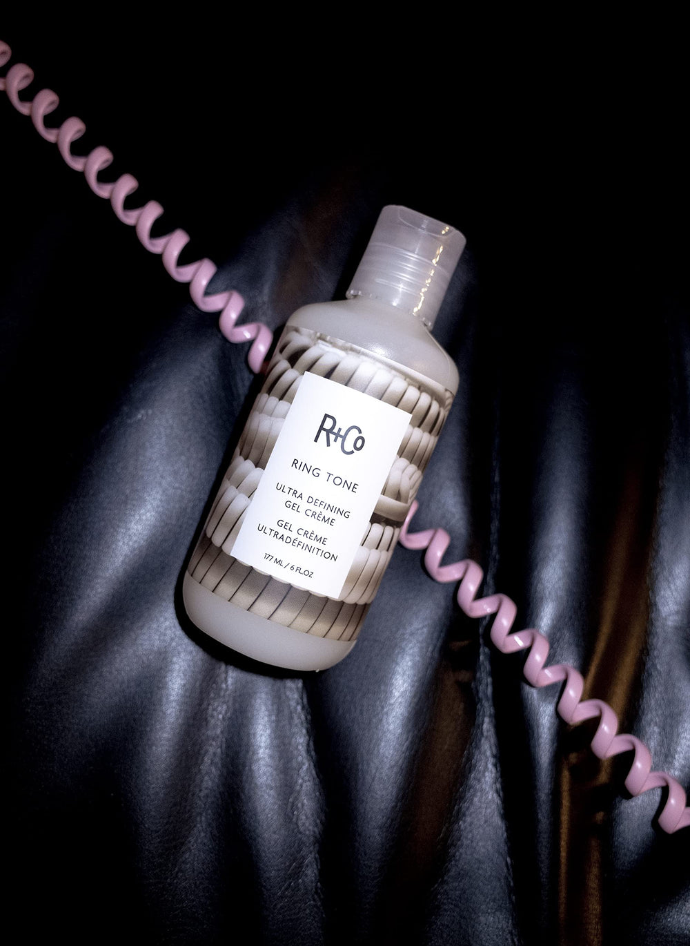 R+Co Ring Tone ingredients close-up with agave and prickly pear oil.