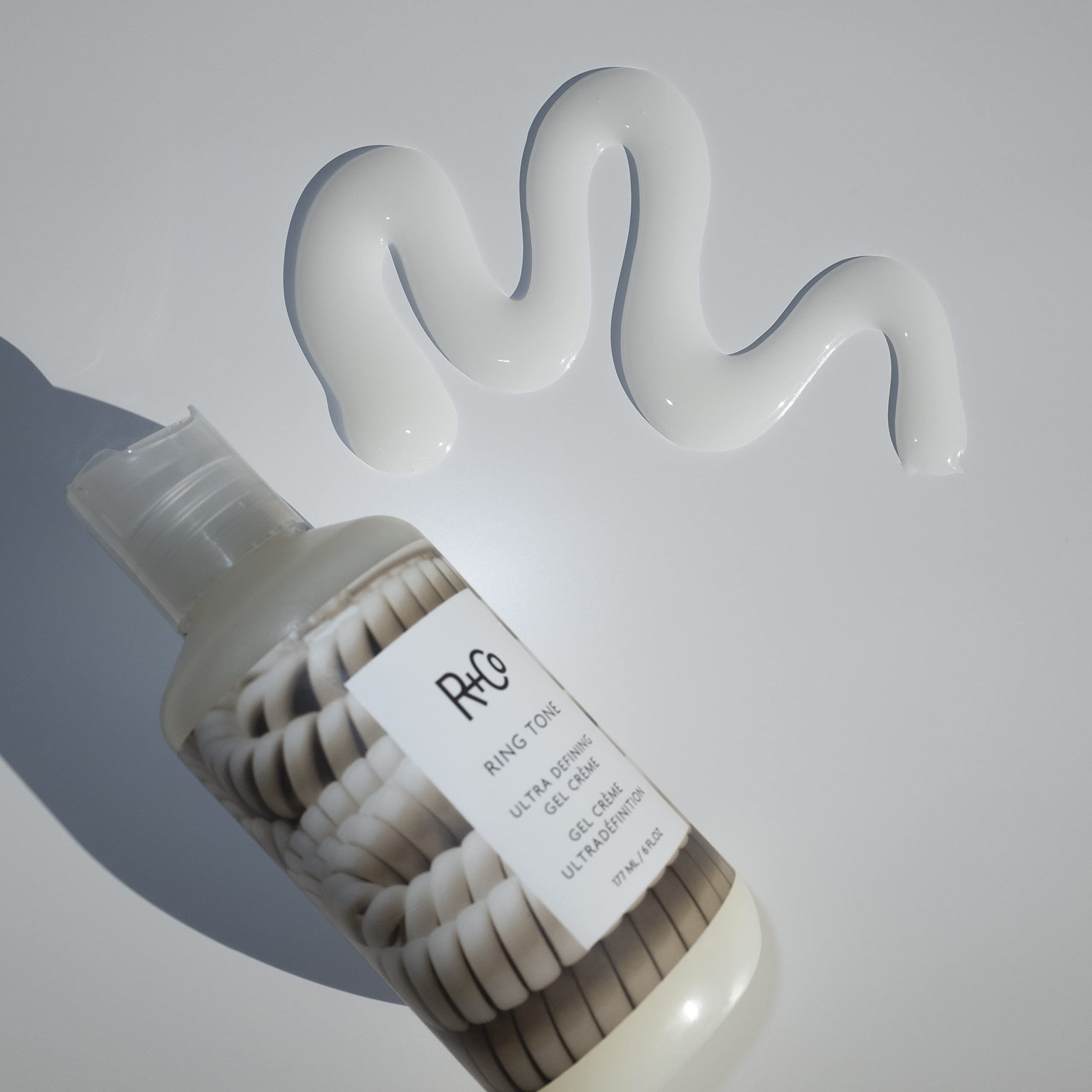 R+Co Ring Tone defined curls with natural-looking texture after use.