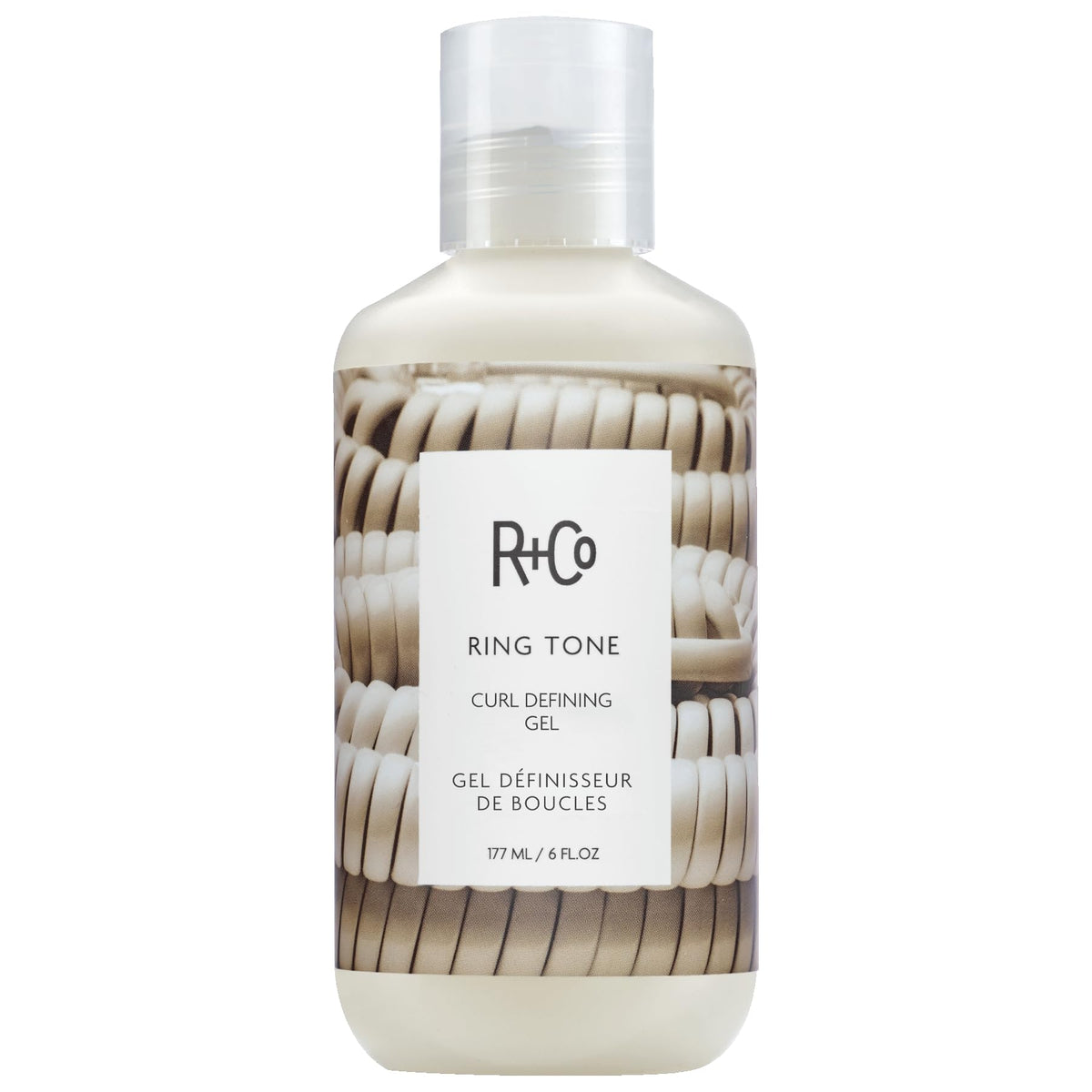 R+Co Ring Tone jar close-up reveals creamy gel texture for defined, frizz-free curls.